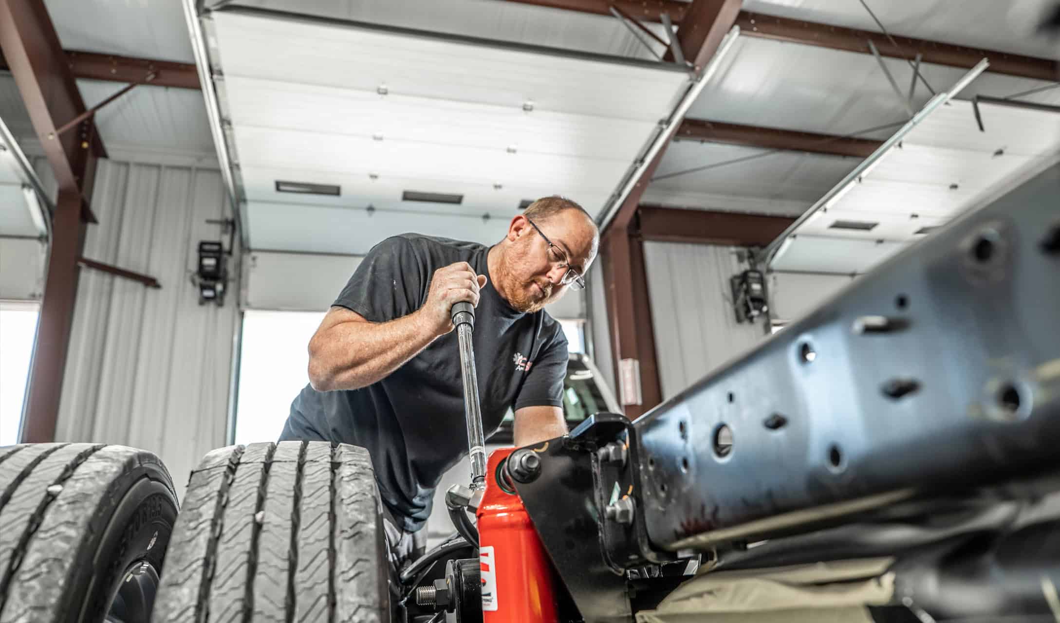 Osage Ambulance employee working on an ambulance