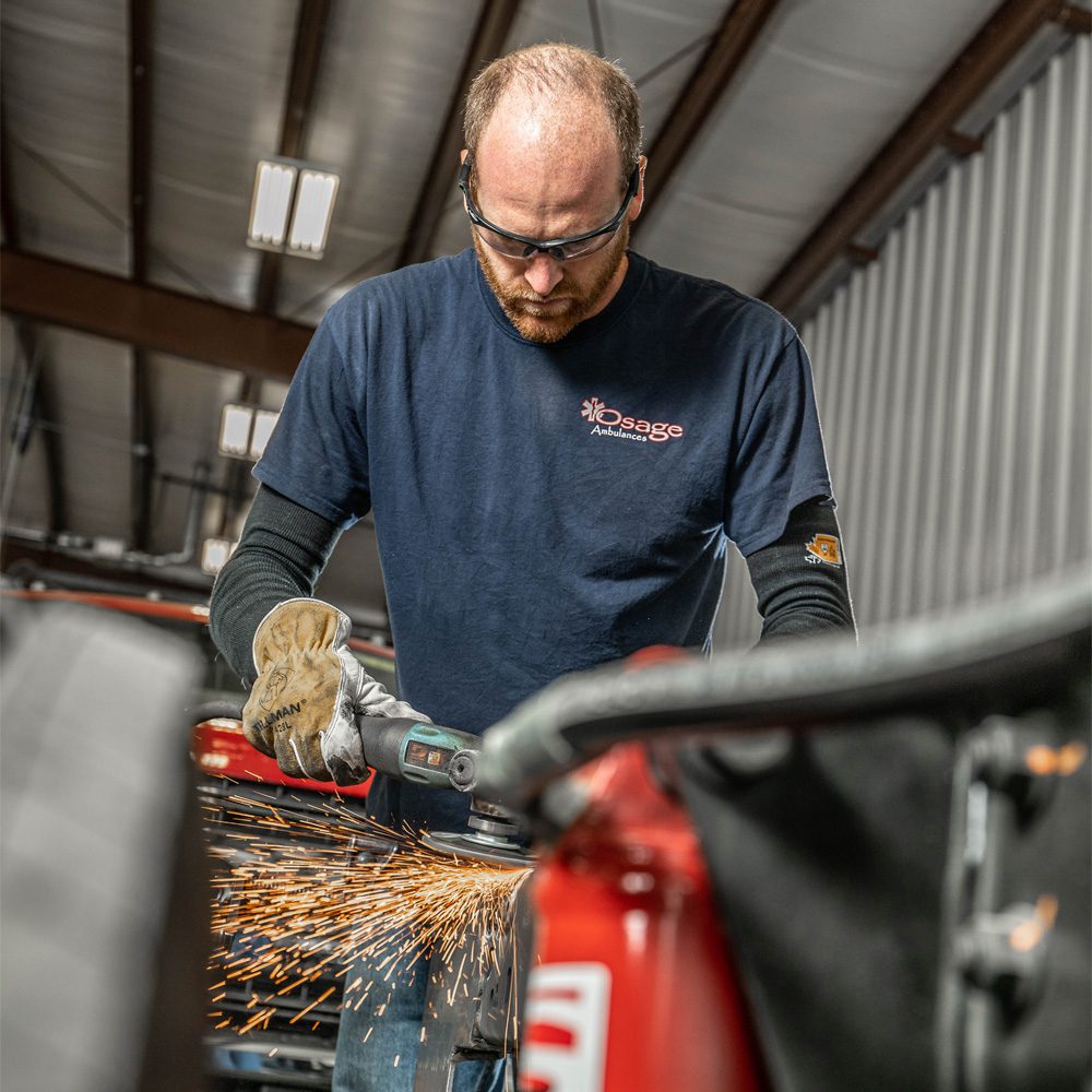 Osage ambulance employee grinding something